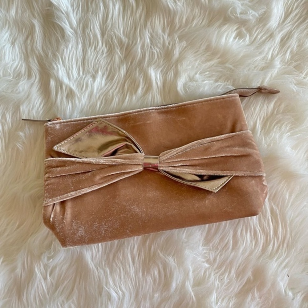 Champagne colored velvet clutch